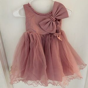 Pink dress with pearls and detachable bow